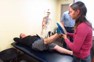 massage therapists taking a workshop CEUs