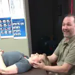 massage therapist teaches class