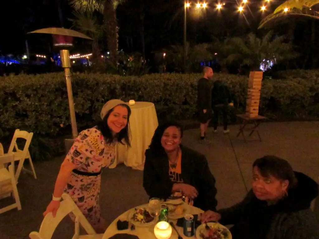 (l-r) Devra Joy Shelton, DPT, Syreeta Nolan (co-founder of Disabled in Higher Education), and her mother Christine Nolan enjoy a dinner conversation at the 2022 San Diego Pain Summit. Friday, Feb. 26, 2022. (Photo by Nick Ng)