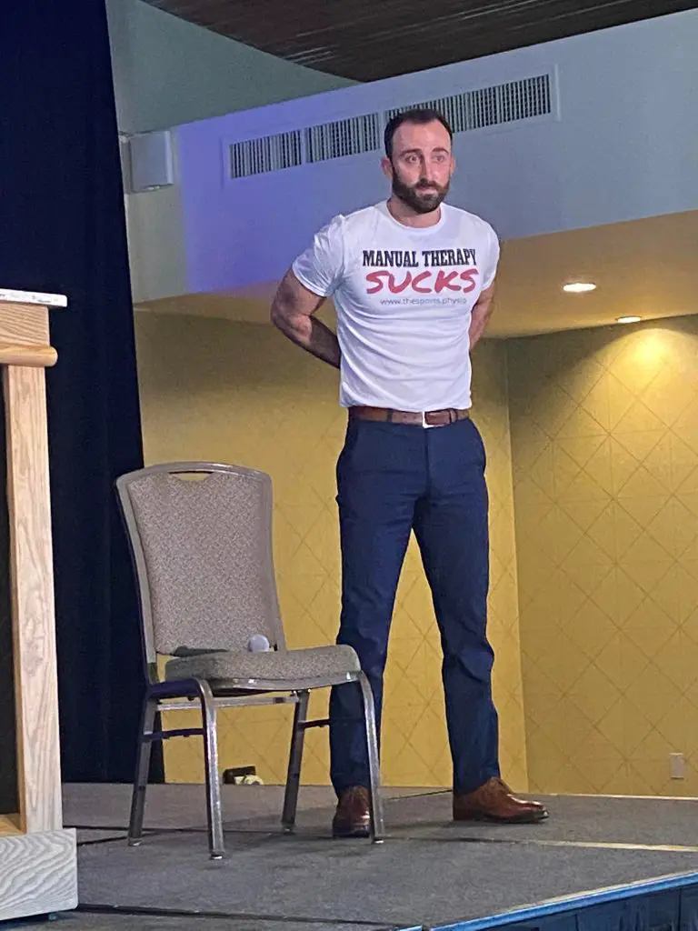 Jarod Hall, DPT, prepares to debate in "Manual Therapy Sucks" at the 2022 San Diego Pain Summit. Sunday, Feb. 27, 2022. (Photo couresty of Jocelyn Derlome)