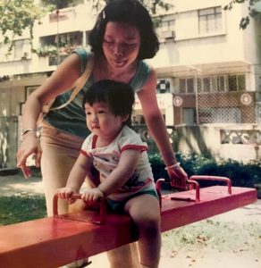 mom and son on a seesaw in macau