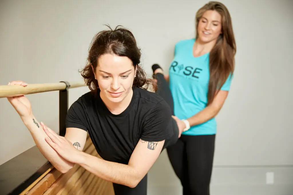 physical therapist Stephanie Irwin works with a dancer in rehab